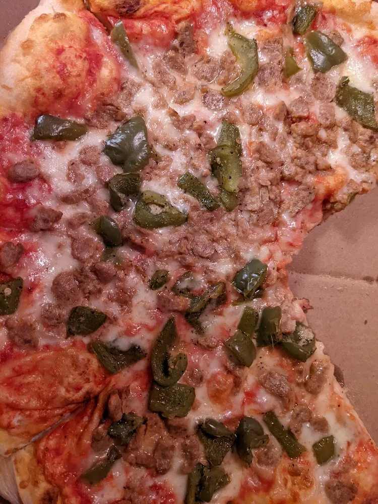 Unlike Other Pizza Places These Guys Load on the Toppings